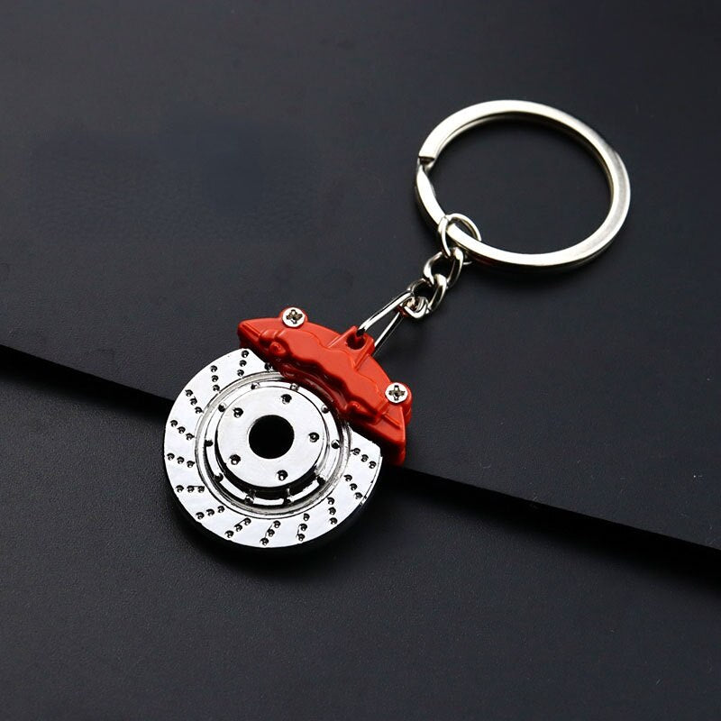 1Pcs Car brake caliper key chain can rotate metal key ring Creative modification Personality key is cool