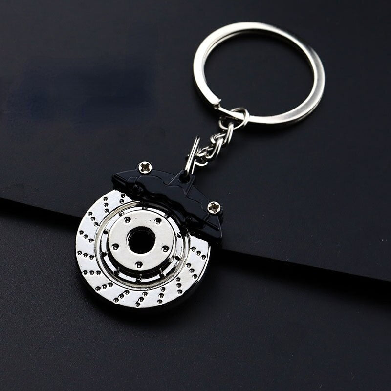 1Pcs Car brake caliper key chain can rotate metal key ring Creative modification Personality key is cool